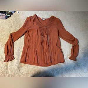 Orange long sleeve shirt
